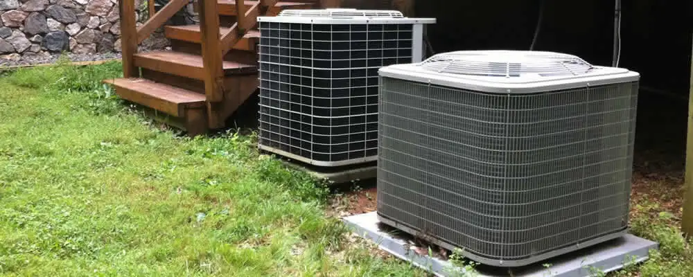 Heat pump installation and service units outside a home in Greenville, NC
